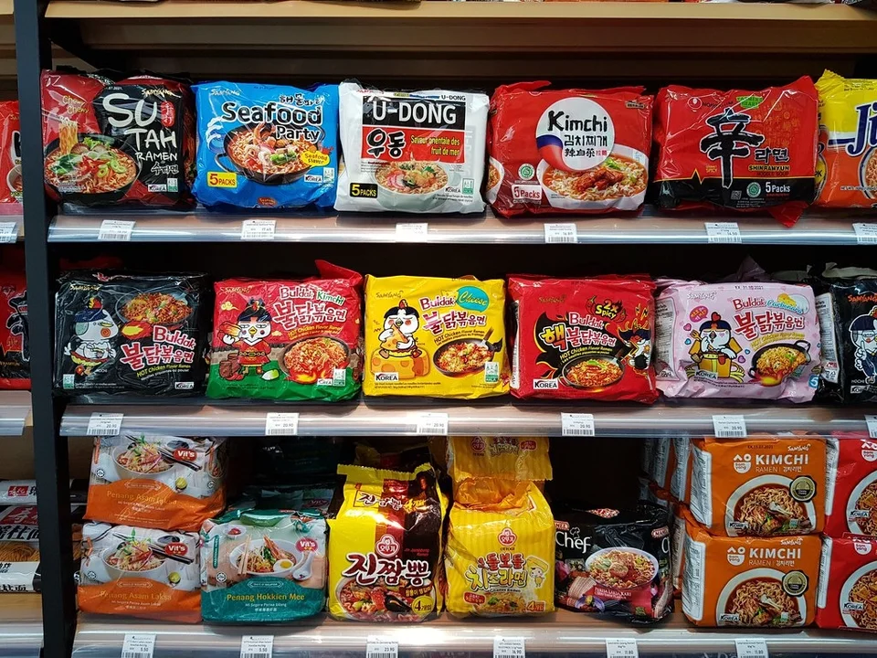 Shelves of packaged noodles and pantry products at Go Fresh Market