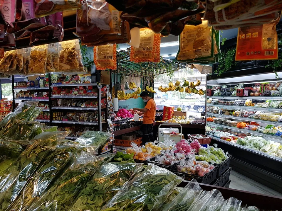 Leafy vegetables and fresh produce displayed inside Go Fresh Market